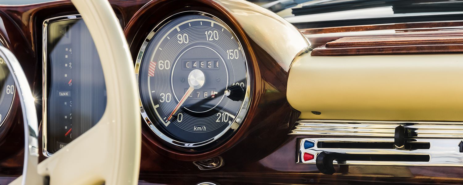 Classic vehicles: Close-up of the speedometer in a classic car.