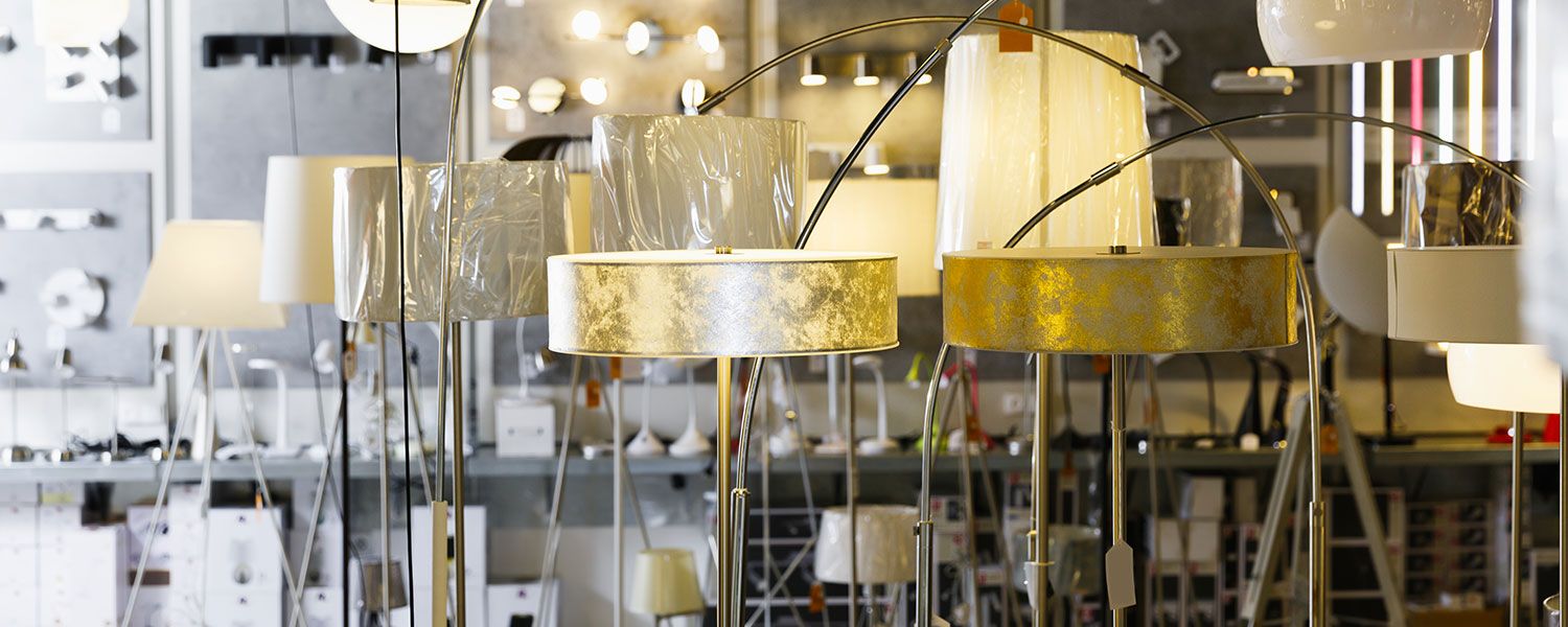Furniture shop insurance: An array of lamps inside a furniture store. 